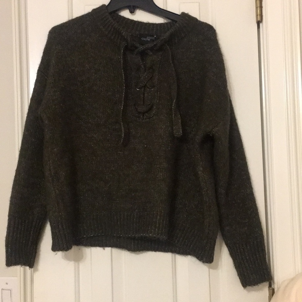 Hunter green lace up sweater.